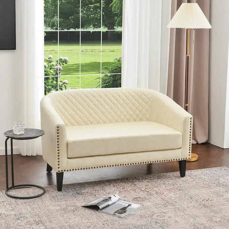 Petit canapé-causeuse touffeté en similicuir 50W