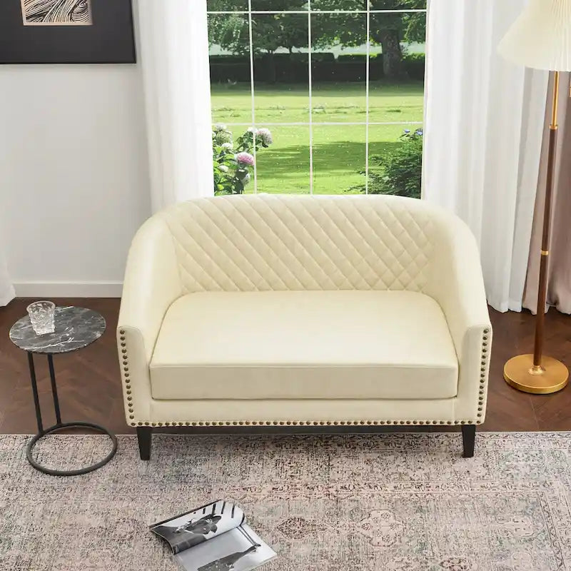 Petit canapé-causeuse touffeté en similicuir 50W